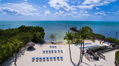 Ocean pointe suites at key largo hotel - Ocean Pointe Suites stands out as one of the best hotels in Key Largo on the beach, offering a harmonious blend of luxury, comfort, and tropical beauty. Spacious suites, pool, hot tub, and beach area are perfect for both adults and children. Enjoy on-site tennis facilities and beach access where you can indulge in water activities like fishing, diving …